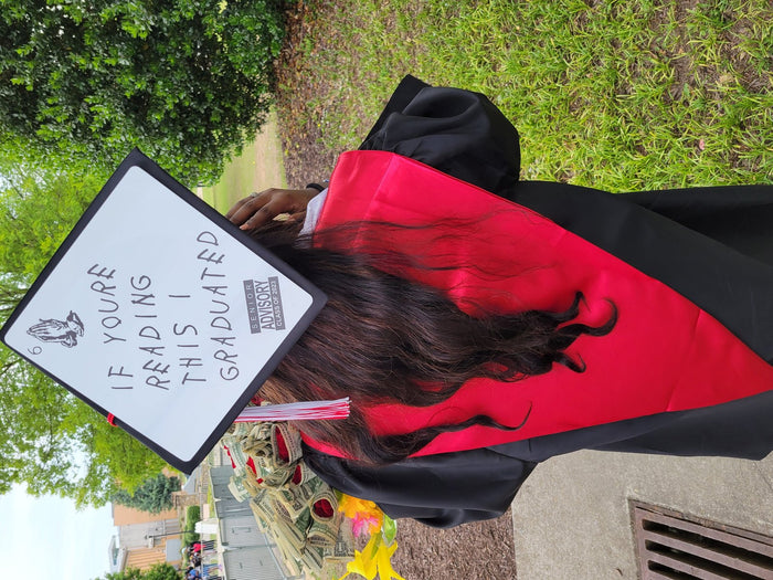 Graduate wearing If Youre Reading This I Graduated cap, back view