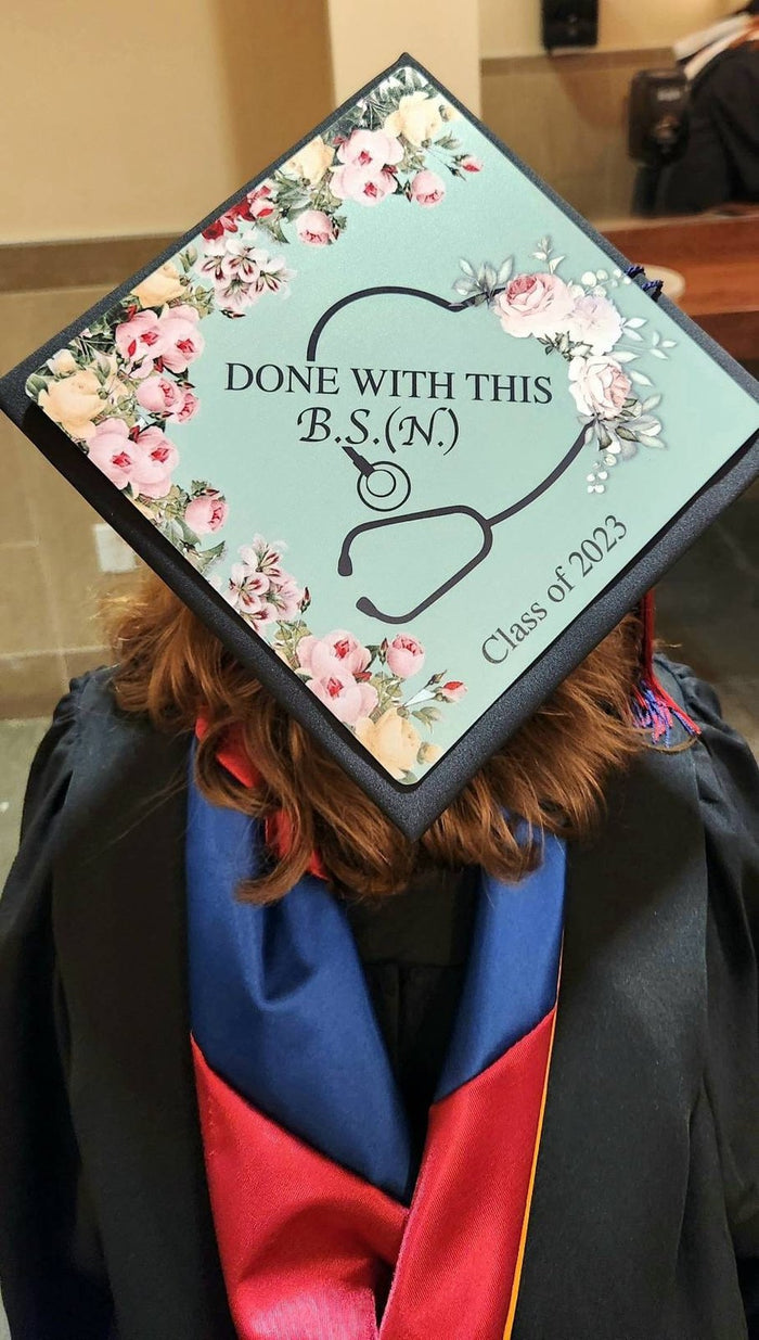 Graduate wearing Done With This BSN stethoscope cap, back view