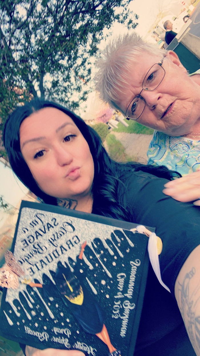 Two women selfie holding Savage Classy Bougie Graduate cap