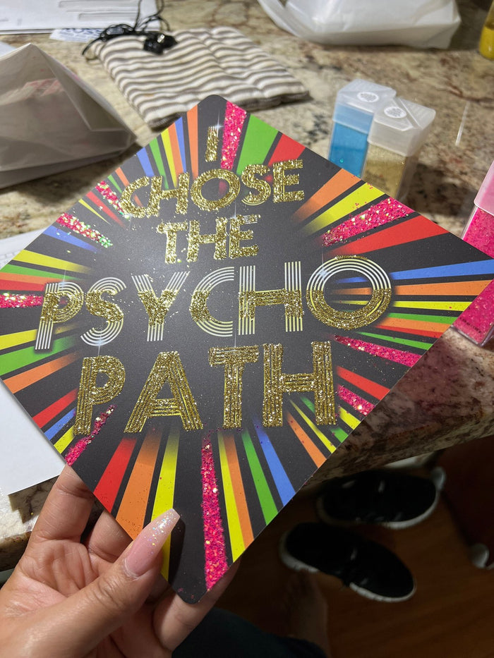 Hand holding I Chose The Psycho Path topper