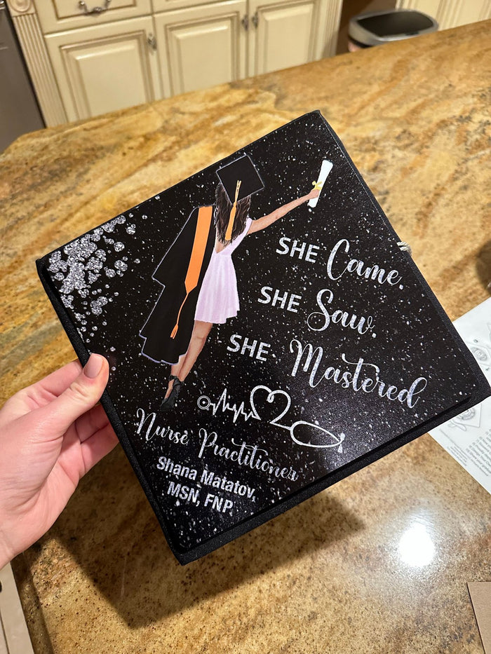 Hand holding She Came She Saw She Mastered nurse practitioner topper