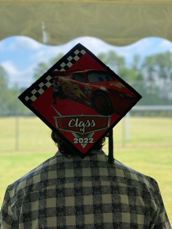 Man wearing Cars Class of 2022 cap, back view