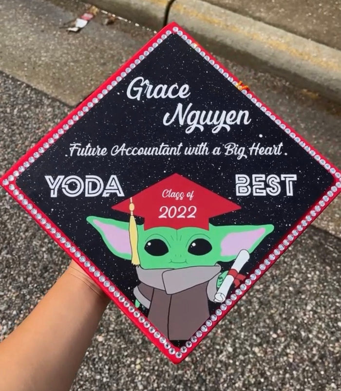 Hand holding Baby Yoda Yoda Best topper