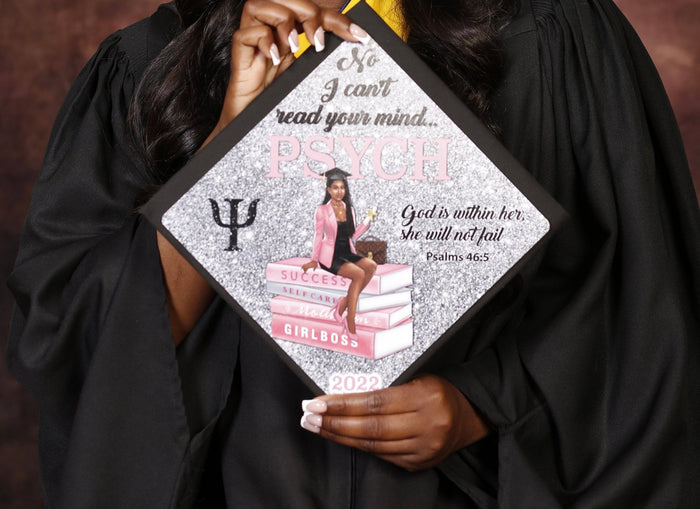 Graduate holding Psych No I Cant Read Your Mind topper