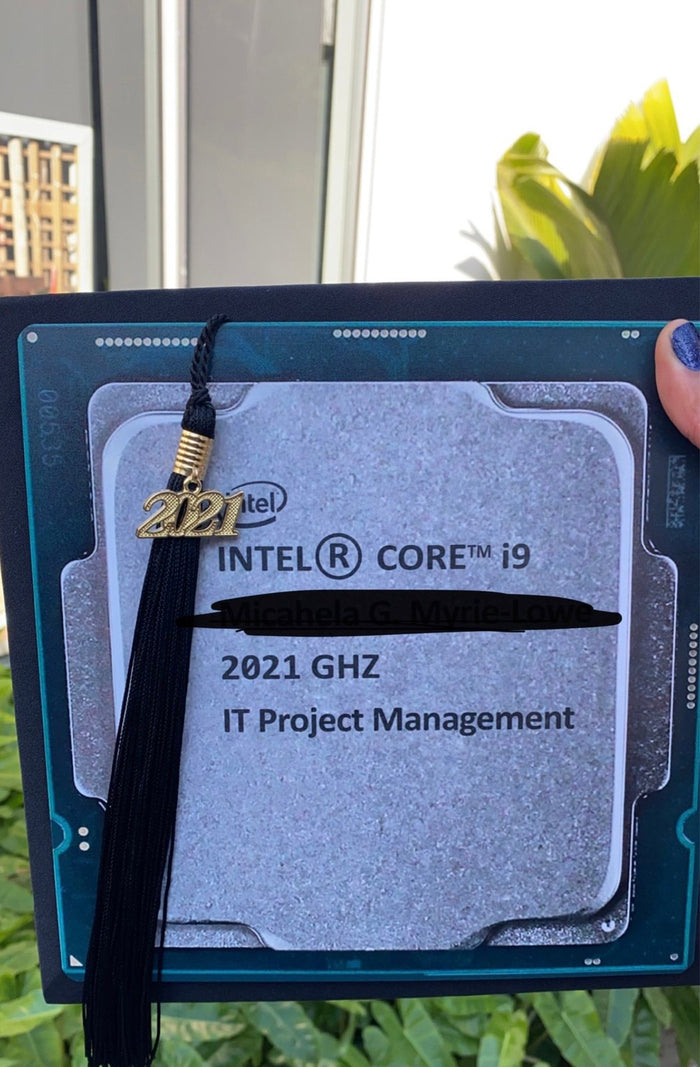 Hand holding Intel CPU IT Project Management cap