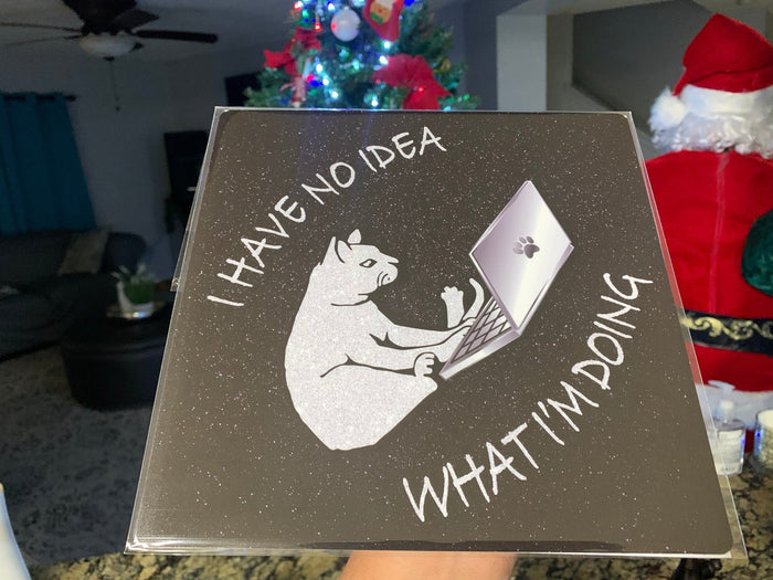 Hand holding cat laptop I Have No Idea topper