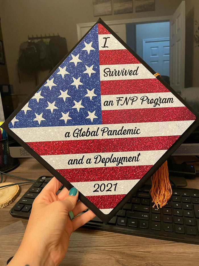 Hand holding US flag FNP Pandemic Deployment cap