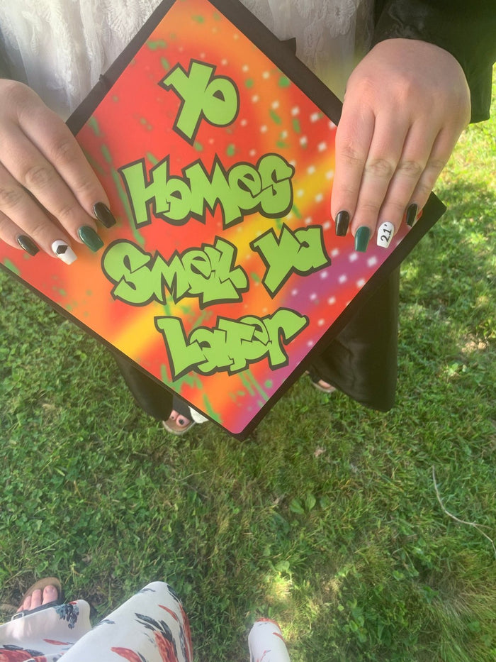 Hands holding Fresh Prince Yo Homes Smell Ya Later topper