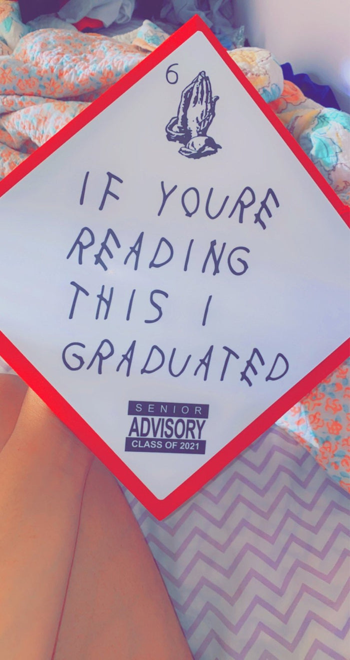 Person holding If Youre Reading This I Graduated topper