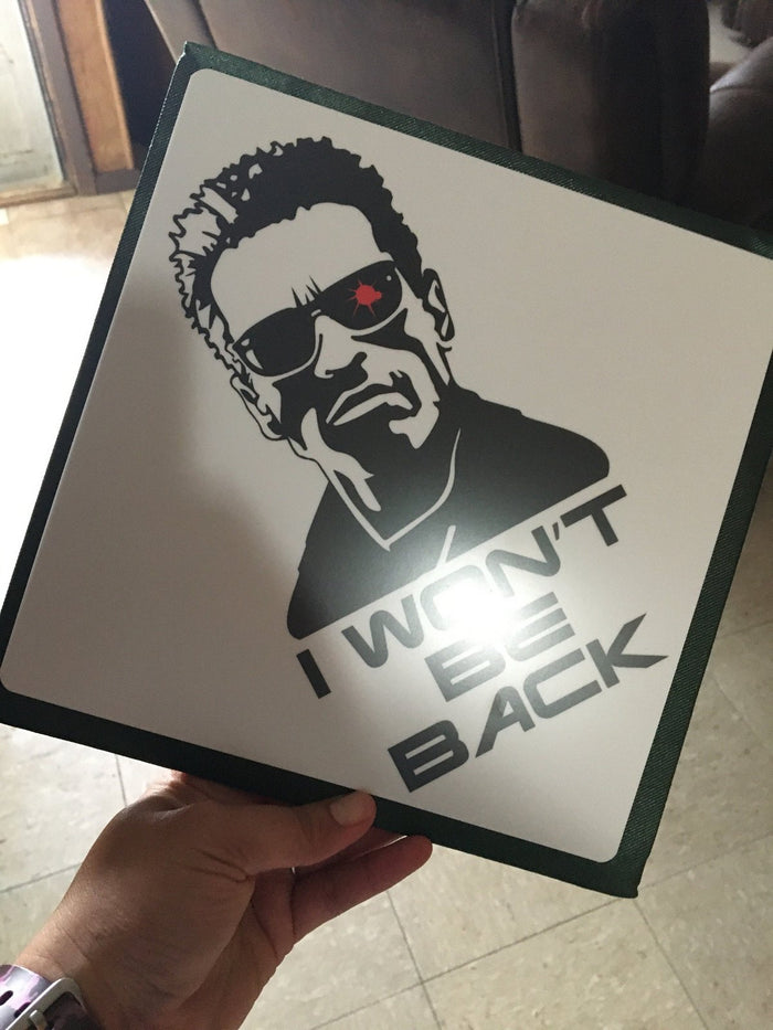 Hand holding Terminator I Wont Be Back topper
