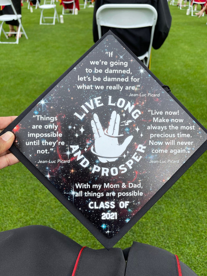 Hand holding Star Trek Live Long And Prosper cap