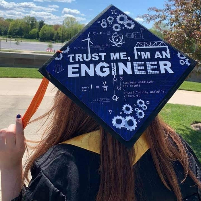 Graduate wearing Trust Me Im An Engineer cap