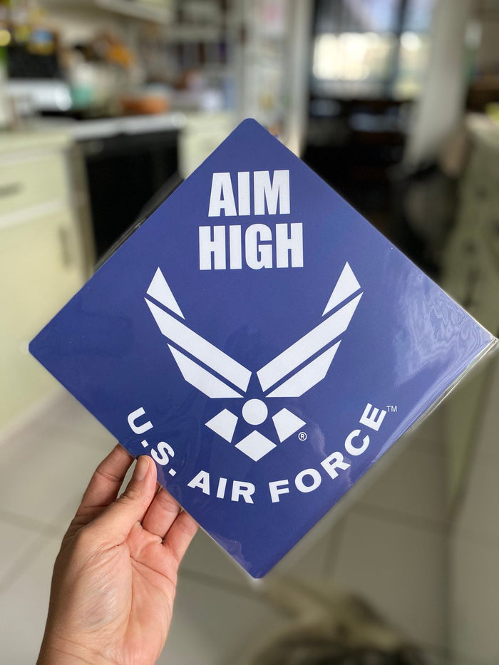 Hand holding Aim High US Air Force topper