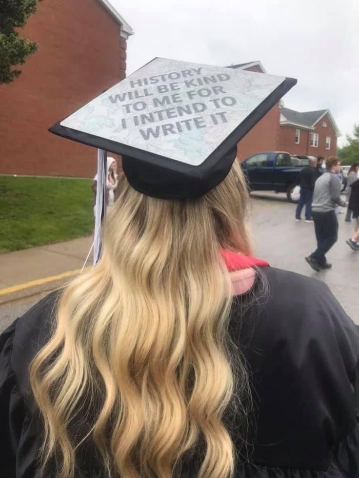 Graduate wearing Hamilton History Will Be Kind cap
