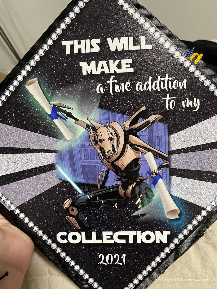 Star Wars Grievous Collection topper on graduates lap