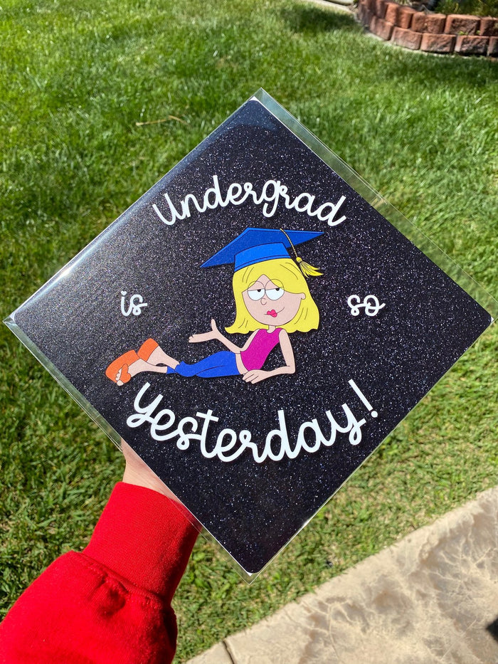 Arm holding Lizzie McGuire Undergrad Is So Yesterday topper