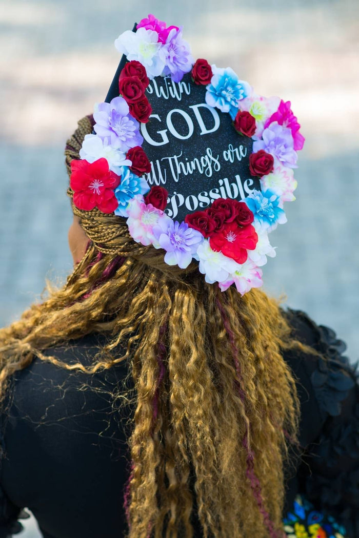 Woman wearing flower With God cap by the sea