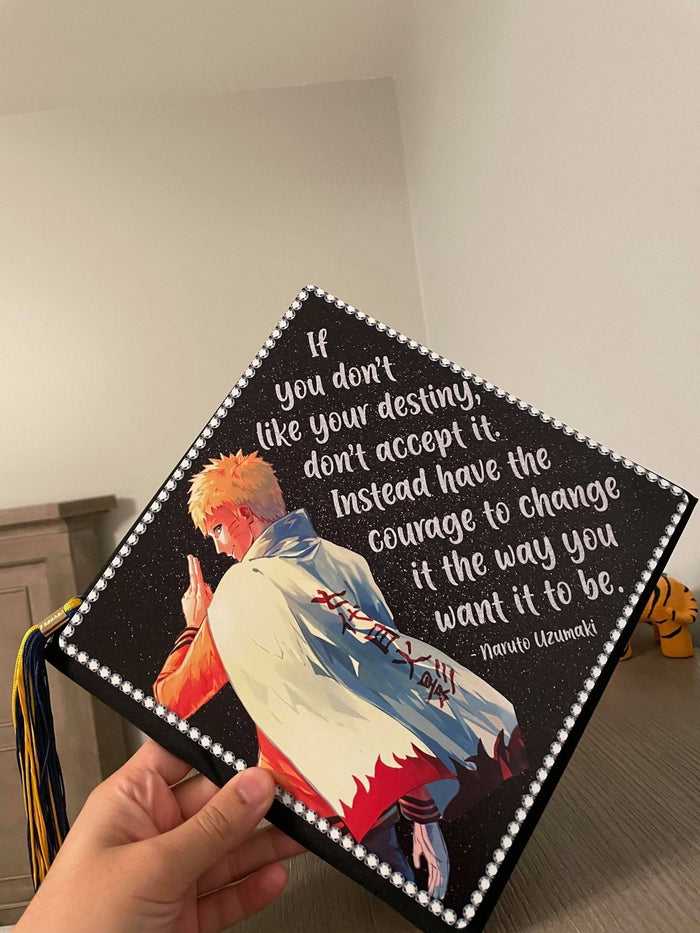 Hand holding Naruto destiny quote topper