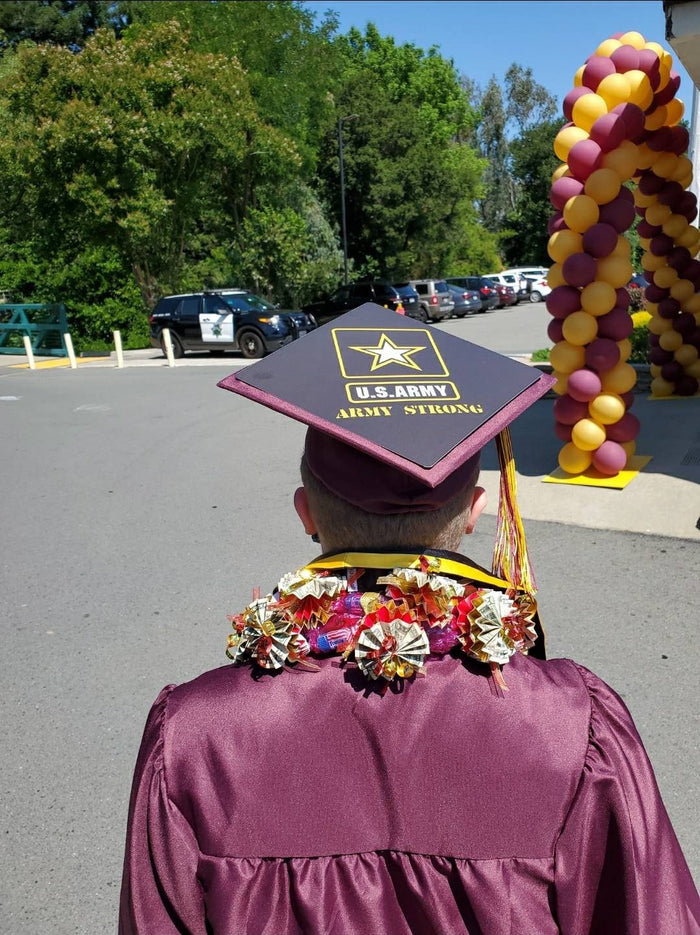 Graduate wearing US Army cap at drive-through ceremony