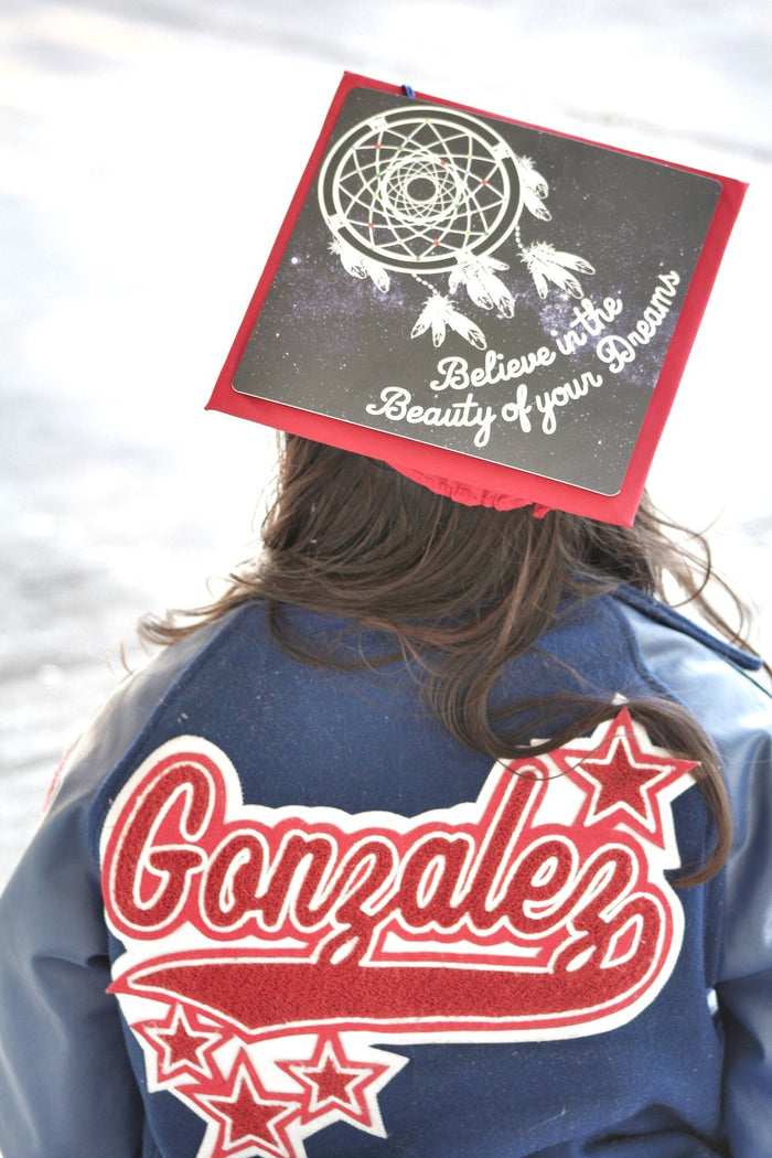 Girl wearing dreamcatcher Believe In Your Dreams cap