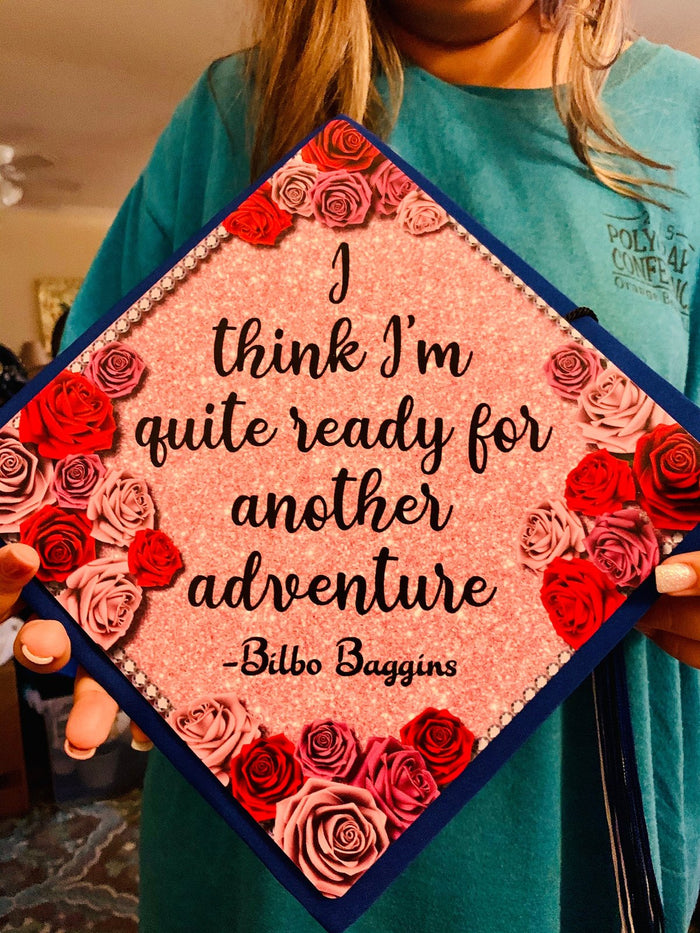 Woman holding Bilbo Baggins Another Adventure topper