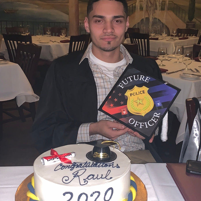Man holding Future Police Officer cap at restaurant