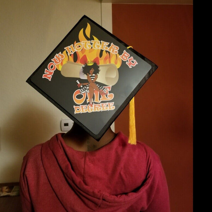 Person wearing Now Hotter By One Degree flame cap