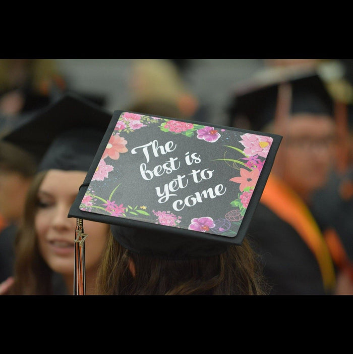 Graduate wearing The Best Is Yet To Come cap at ceremony