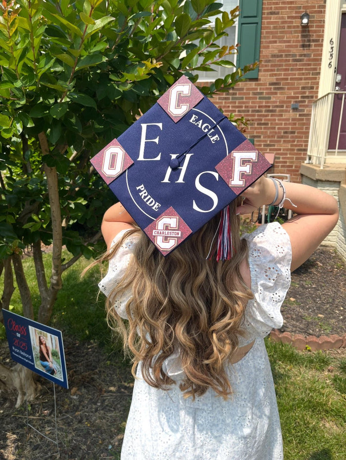 Girl wearing CEHS Eagles cap outdoors