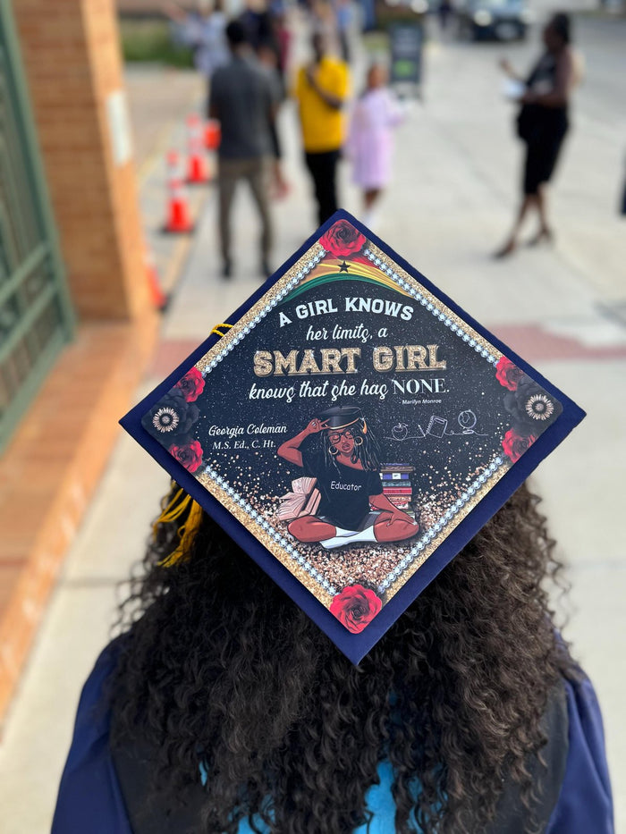 Graduate wearing Smart Girl book cap