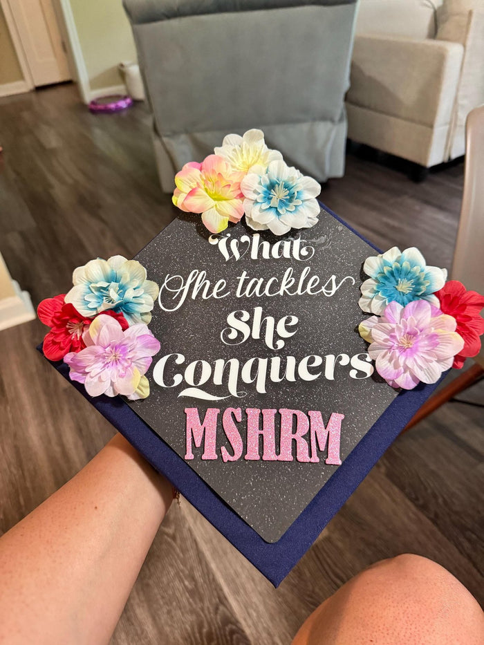 What She Tackles She Conquers MSHRM topper on lap