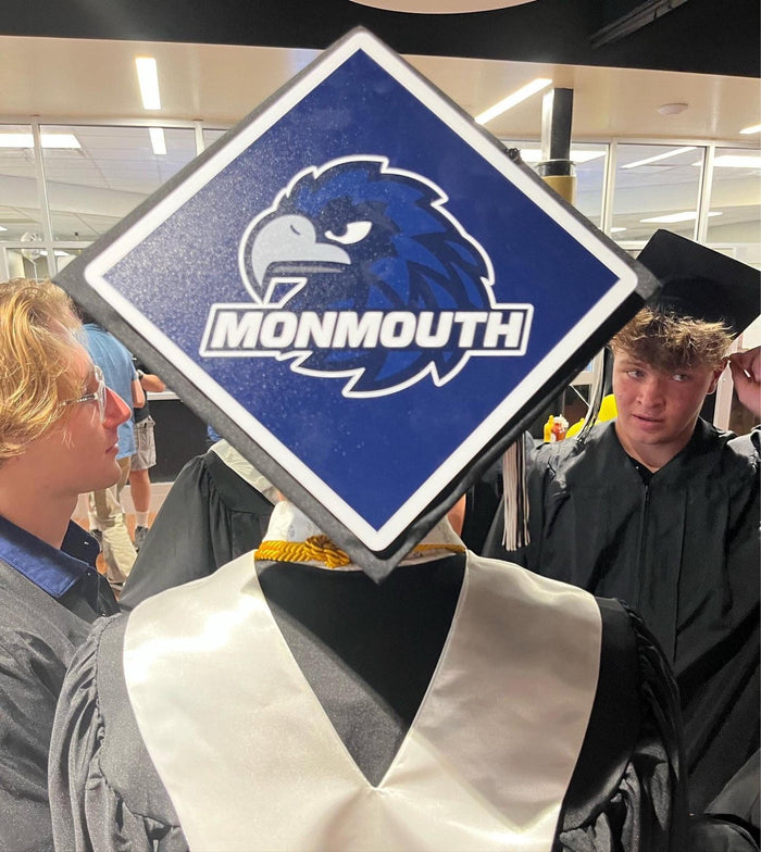 Graduate wearing Monmouth hawks cap