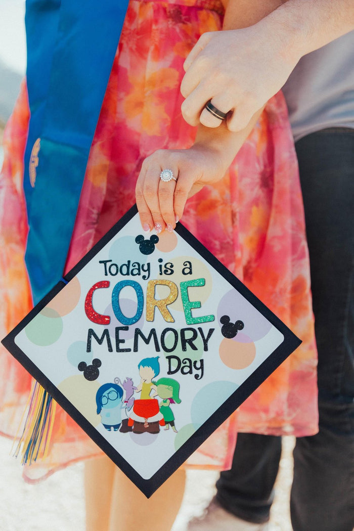 Hands holding Inside Out Core Memory Day topper