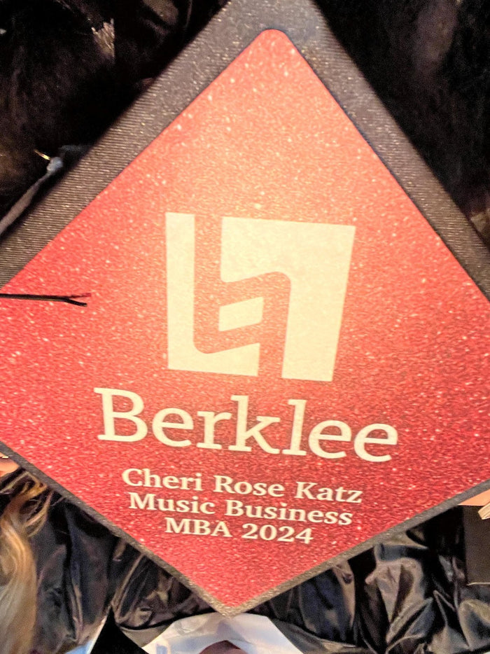 Graduate wearing Berklee MBA 2024 cap