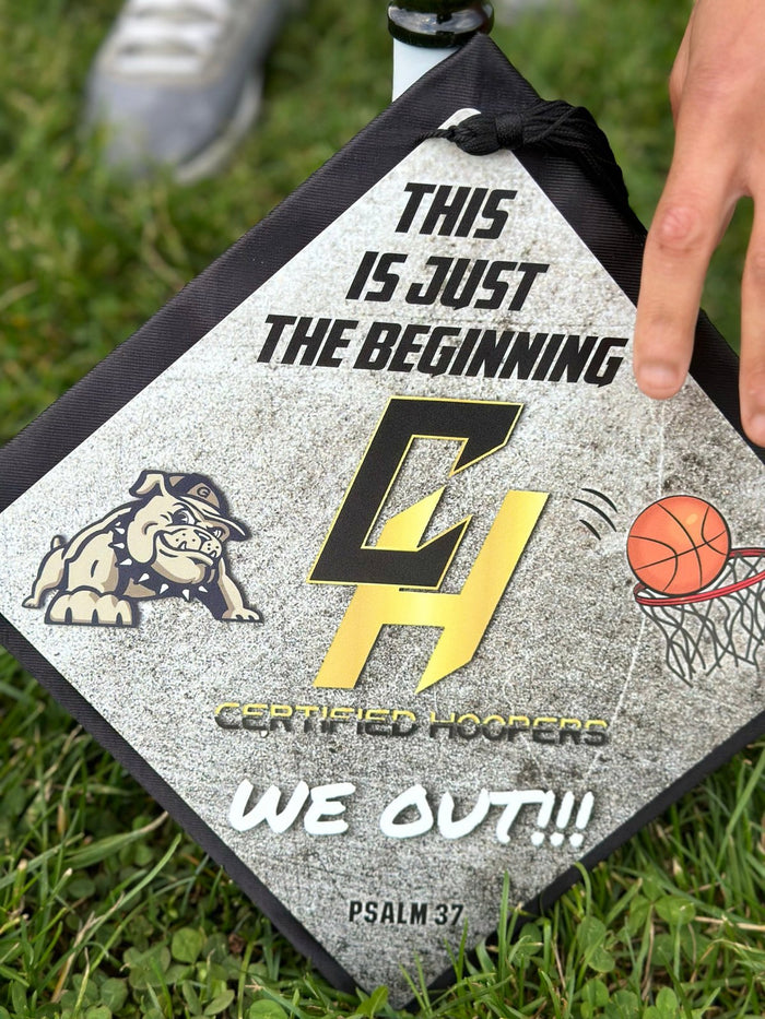 Hand holding This Is Just The Beginning hoopers topper