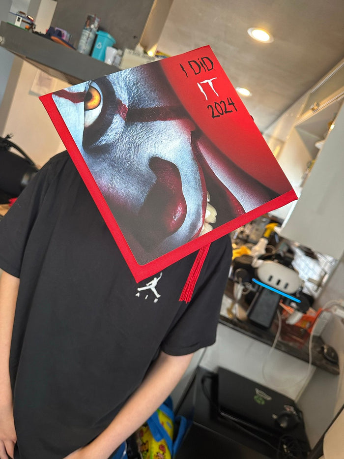 Person holding Pennywise I Did It 2024 topper