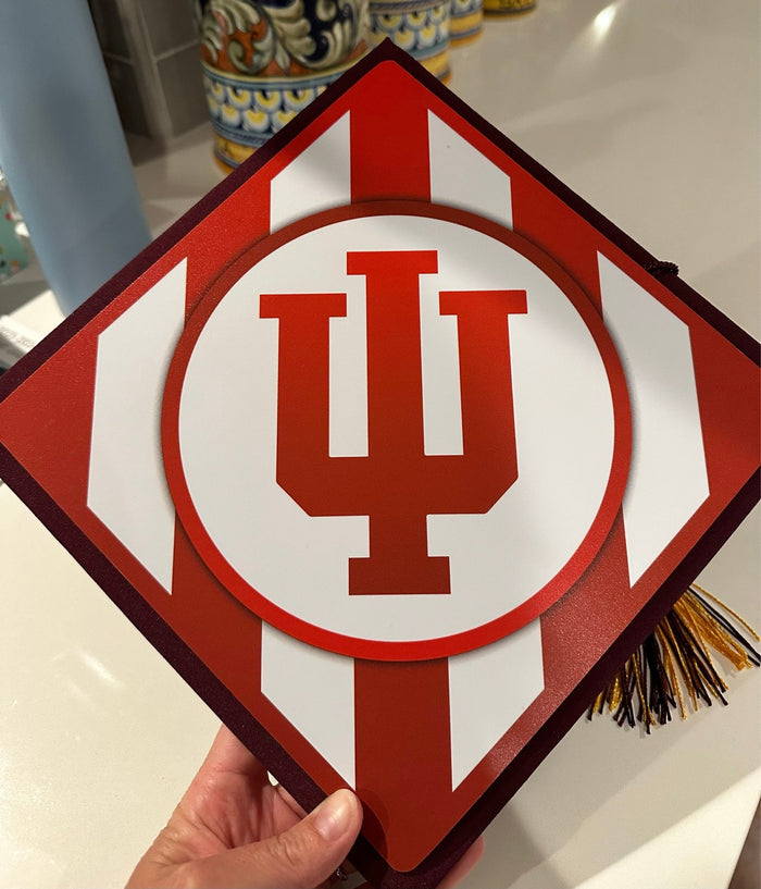 Hand holding Indiana IU topper