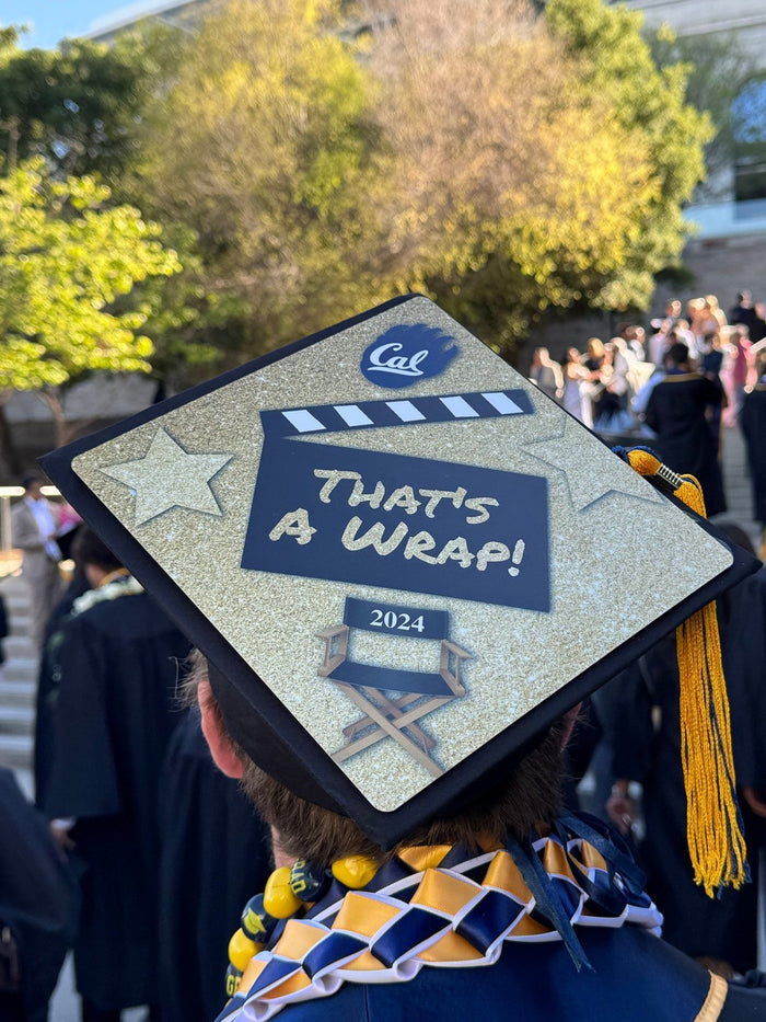 Graduate wearing Cal Thats A Wrap cap