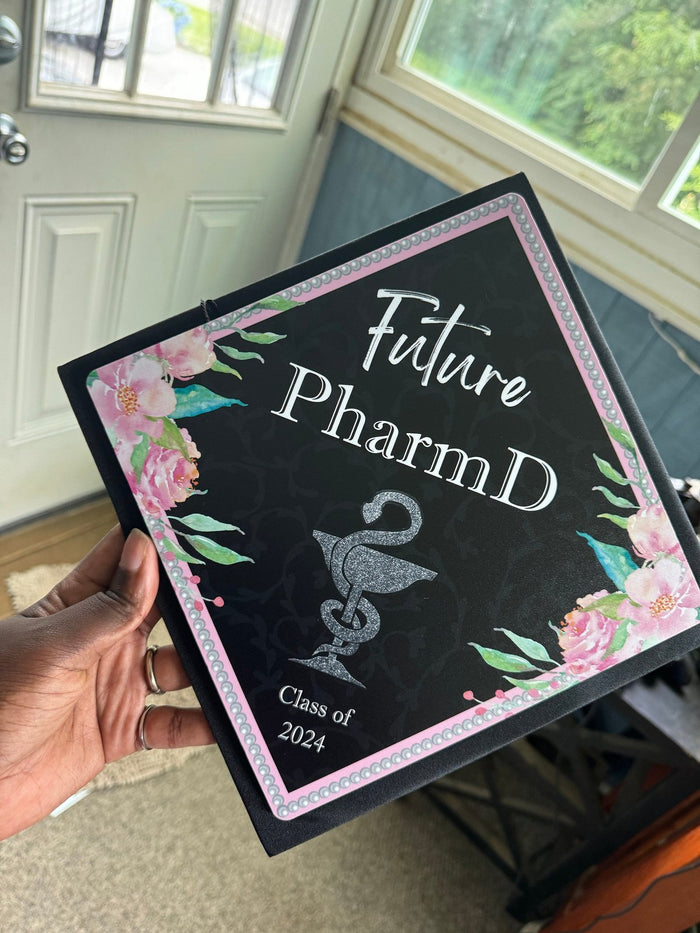 Hand holding Future PharmD topper