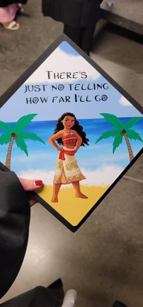 Hand holding Moana How Far Ill Go topper