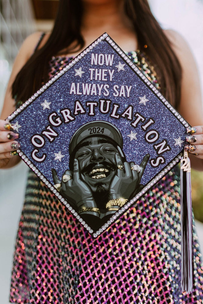 Woman holding Post Malone Congratulations topper