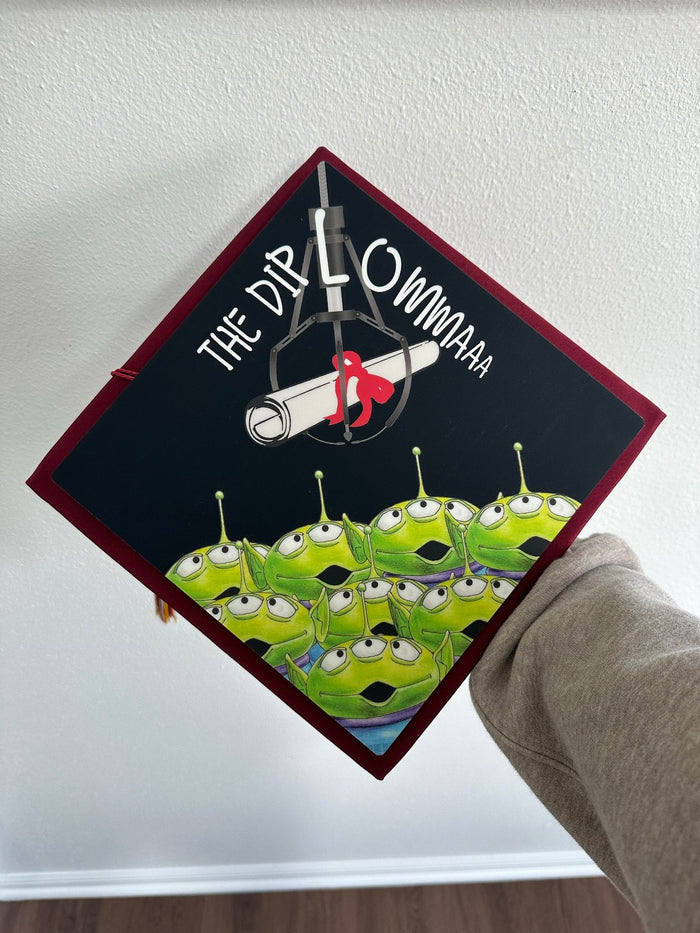Arm holding Toy Story The Dip topper