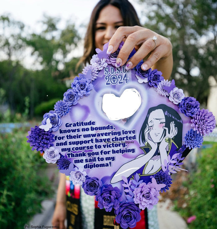 Woman holding purple floral anime heart topper