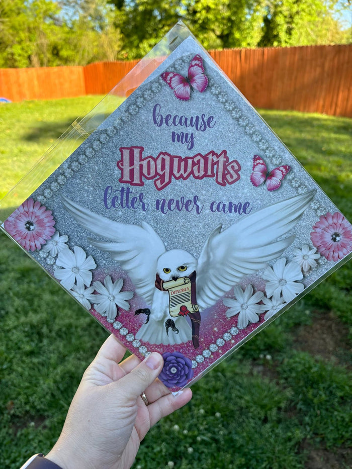 Hand holding Hogwarts Letter Never Came topper
