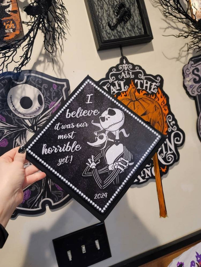 Hand holding Nightmare Before Christmas topper