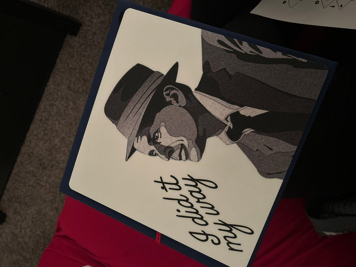 Sinatra I Did It My Way topper on lap