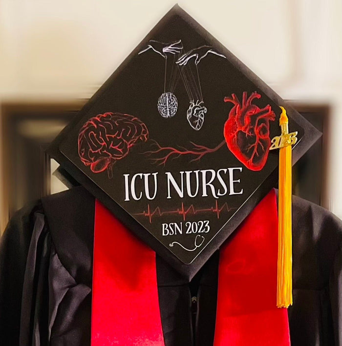 Graduate wearing ICU Nurse BSN 2023 cap