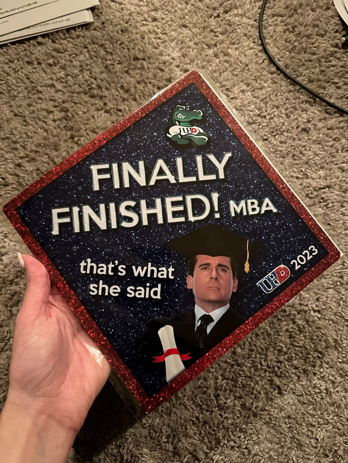 Hand holding Finally Finished MBA Michael Scott topper