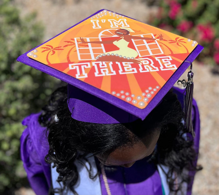 Graduate wearing Im There Tiana cap