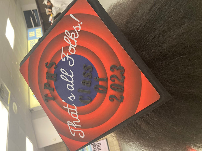 Graduate wearing Thats All Folks Class of 2023 cap
